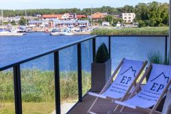 noclegi Dziwnów Apartament DZIWNA RIVER z frontowym widokiem na rzekę i basenem Dziwnów EPapartamenty