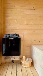 noclegi Gąski Nadmorskie Chatki - SAUNA - OPCJA Z PRYWATNĄ BALIĄ KĄPIELOWĄ LUB BEZ