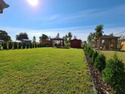 noclegi Trzęsacz Ferienhaus Lilja mit Garten, Kamin und Pool