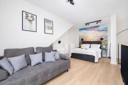 noclegi Niechorze Eleganckie Apartamenty Blisko Plaży w Niechorzu z Klimatyzacją w Salonie i Parkingiem by Noclegi Renters