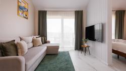 noclegi Jantar Flatbook - Przytulny Apartament 307 w Jantar Resort z Parkingiem, Placem Zabaw i Strefą Grilla