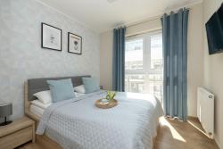 noclegi Ustronie Morskie Jasny Apartament Sun Seasons 24 z Umeblowanym Balkonem i Parkingiem by Noclegi Renters