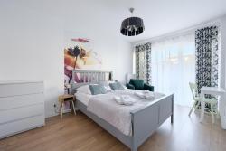 noclegi Kołobrzeg ApartamentyPrzyMorzu Bałtycki z miejscem postojowym i ogródkiem