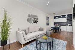 noclegi Mielno Central Park - Apartament w Mielnie z Parkingiem Blisko Plaży i Jeziora by Noclegi Renters