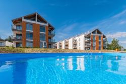 noclegi Krynica Morska Flatbook Apartamenty Krynica Morska Enklawa z basenem i salą zabaw przy Zalewie