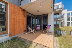 noclegi Krynica Morska Flatbook Apartament Miami Beach - basen, taras i stylowe wnętrza w Krynicy Morskiej