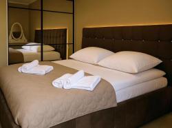 noclegi Kołobrzeg Nadmorskie Tarasy Apartament Park i Morze z garażem, basen, sauna, jacuzzi