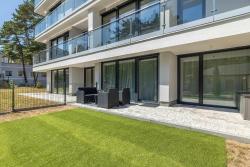 noclegi Międzywodzie Urokliwy Apartament z Ogródkiem 150 m od Plaży Parking Międzywodzie by Noclegi Renters