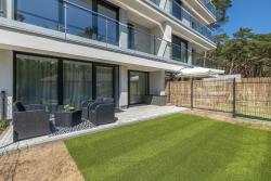 noclegi Międzywodzie Urokliwy Apartament z Ogródkiem 150 m od Plaży Parking Międzywodzie by Noclegi Renters