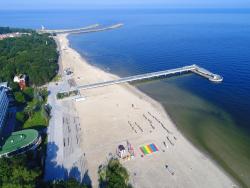 noclegi Rewal Holiday home in a holiday park Rewal at 600 m from the sea