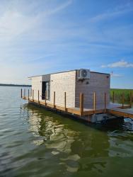 noclegi Dąbki Domki na wodzie, Apartamenty, Houseboat, Jezioro Bukowo, Mierzeja "Natura Dąbkowice 5G"