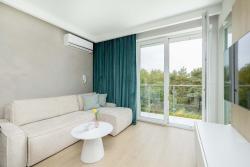 noclegi Kołobrzeg Stylish Apartment in Kołobrzeg with Air Conditioning and Parking by Noclegi Renters