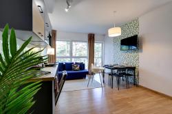 noclegi Poddąbie Poddąbek Comfort I Apartamenty z tarasem na dachu, ogródkiem, basenem zewnętrznym i wewnętrznym, salą zabaw i animacjami