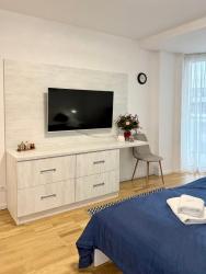 noclegi Kołobrzeg AL-DOM Apartament De Luxe z bocznym widokiem na morze i miejscem w hali garażowej