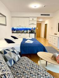 noclegi Kołobrzeg AL-DOM Apartament De Luxe z bocznym widokiem na morze i miejscem w hali garażowej