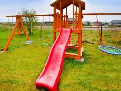 noclegi Sarbinowo Apartment with a playground, close to the beach