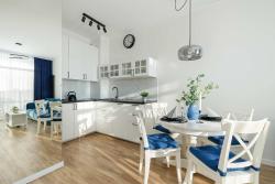 noclegi Sianożęty Blue and Beige Apartment in Sianożęty with Seasonal Pool, Parking and Balcony by Noclegi Renters