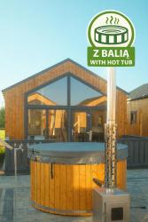 noclegi Gąski Nadmorskie Chatki - SAUNA - OPCJA Z PRYWATNĄ BALIĄ KĄPIELOWĄ LUB BEZ