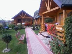 noclegi Rusinowo Holiday Home Gemütliches Holzferienhaus mit Grill und Garten by Interhome