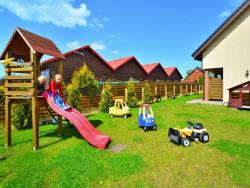 noclegi Sarbinowo Apartment with a playground, close to the beach