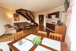 noclegi Osieki Comfortable holiday homes, pool, jacuzzi, sauna