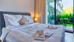 noclegi Niechorze Rezydencja Niechorze PREMIUM 119 z Ogródkiem, Basenem, Sauną, Jacuzzi, przy samej PLAŻY - 5D Apartments