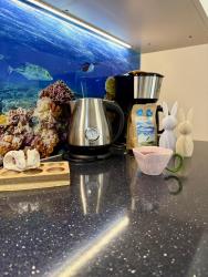 noclegi Kołobrzeg AL-DOM Apartament De Luxe z bocznym widokiem na morze i miejscem w hali garażowej