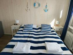 noclegi Międzyzdroje Gryfhaus - Pokój Bosmański, kameralny, 22 m2, parking, Wi-Fi, blisko morza, wysoka ocena 9,9