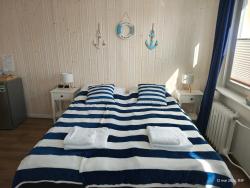 noclegi Międzyzdroje Gryfhaus - Pokój Bosmański, kameralny, 22 m2, parking, Wi-Fi, blisko morza, wysoka ocena 9,9