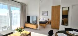noclegi Jantar Amber Sky Jantar Resort by TriApart - grill, boisko, dwa miejsca parkingowe