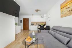 noclegi Mielno Enklawa - Apartament z Tarasem blisko Plaży i Jeziora by Noclegi Renters