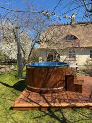 noclegi Ustronie Morskie OAZA POD STRZECHĄ Klimatyczny dom na wyłączność z jacuzzi i dużym ogrodem