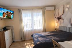 noclegi Międzywodzie Apartment with swimming pool and jacuzzi, Mi dzywodzie