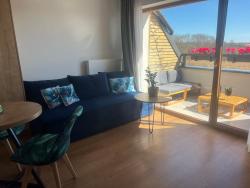 noclegi Sarbinowo Apartament Niebieski Centrum Sarbinowo w budynku z restauracją, BASEN ZEWNĘTRZNY, PARKING W CENIE