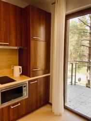 noclegi Jastrzębia Góra Pod Sosnami - basen, sauna, garaż, obok nadmorskiego lasu - Villa 4 Pory Roku