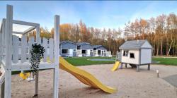 noclegi Rewal Lumi Resort Domki letniskowe z podgrzewanym basenem