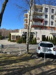 noclegi Kołobrzeg Seaside Polanki Apartments - summer outdoor swimming pool, saunas, two playgrounds for children, gym, individual garage included in the price Klonowa 17E