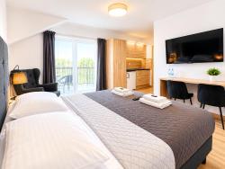 noclegi Krynica Morska ROYAL Villa RESORT & SPA - Jacuzzi, Sauny, MELEX na plażę, Masaże, Apartamenty z kuchnią, Widok na Zalew Wiślany