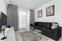 noclegi Międzyzdroje Nowoczesny Apartament z Balkonem Blisko Plaży by Noclegi Renters