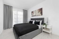 noclegi Międzyzdroje Nowoczesny Apartament z Balkonem Blisko Plaży by Noclegi Renters