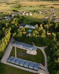 noclegi Rewal Lumi Resort - domki nad morzem - w otoczeniu natury - z podgrzewanym basenem i siłownią