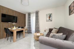 noclegi Międzywodzie Przytulny Apartament Blisko Plaży z Parkingiem by Noclegi Renters