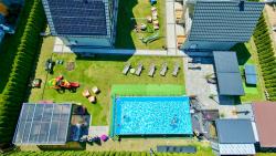 noclegi Grzybowo Domki Gala- blisko plaży, basen z podgrzewaną wodą , sauna , parking