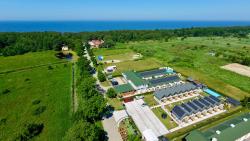 noclegi Grzybowo Domki Gala- blisko plaży, basen z podgrzewaną wodą , sauna , parking