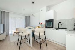 noclegi Międzywodzie Sunny Apartment with a Balcony & Parking Near the Beach in Międzywodzie by Noclegi Renters
