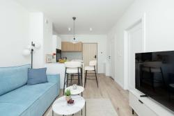 noclegi Międzywodzie Sunny Apartment with a Balcony & Parking Near the Beach in Międzywodzie by Noclegi Renters