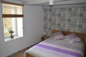 Maisons de vacances Aux Volets Bleus Chez Mark & Sylvie : photos des chambres