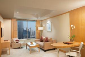 Premium One-Bedroom Suite room in Carlton Downtown Hotel
