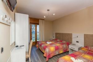 Triple Room with Balcony room in Garnì Casa Rabagno