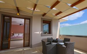 Deluxe Triple Room with Sea View room in Petani Resort